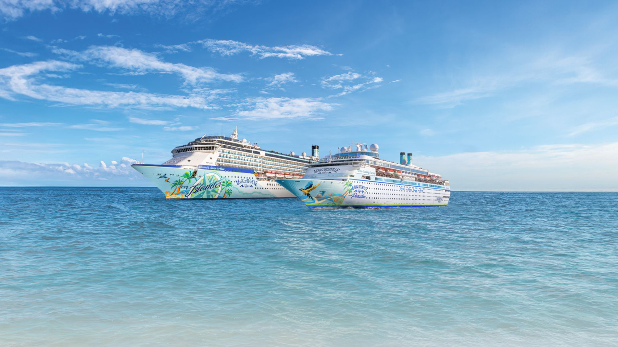 Two colorful cruise ships anchored in crystal-clear blue waters with a vibrant blue sky and white