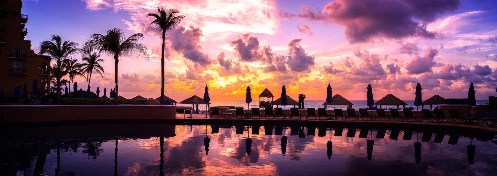 Colorful Mexican coastal town with traditional architecture and vibrant buildings along the waterfront